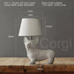 Lampe chiot avec cordon électrique visible