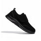 Vue latérale des mocassins noirs en tissu doux