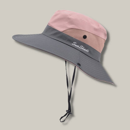 Chapeau rose avec cordon ajustable, idéal pour l'été