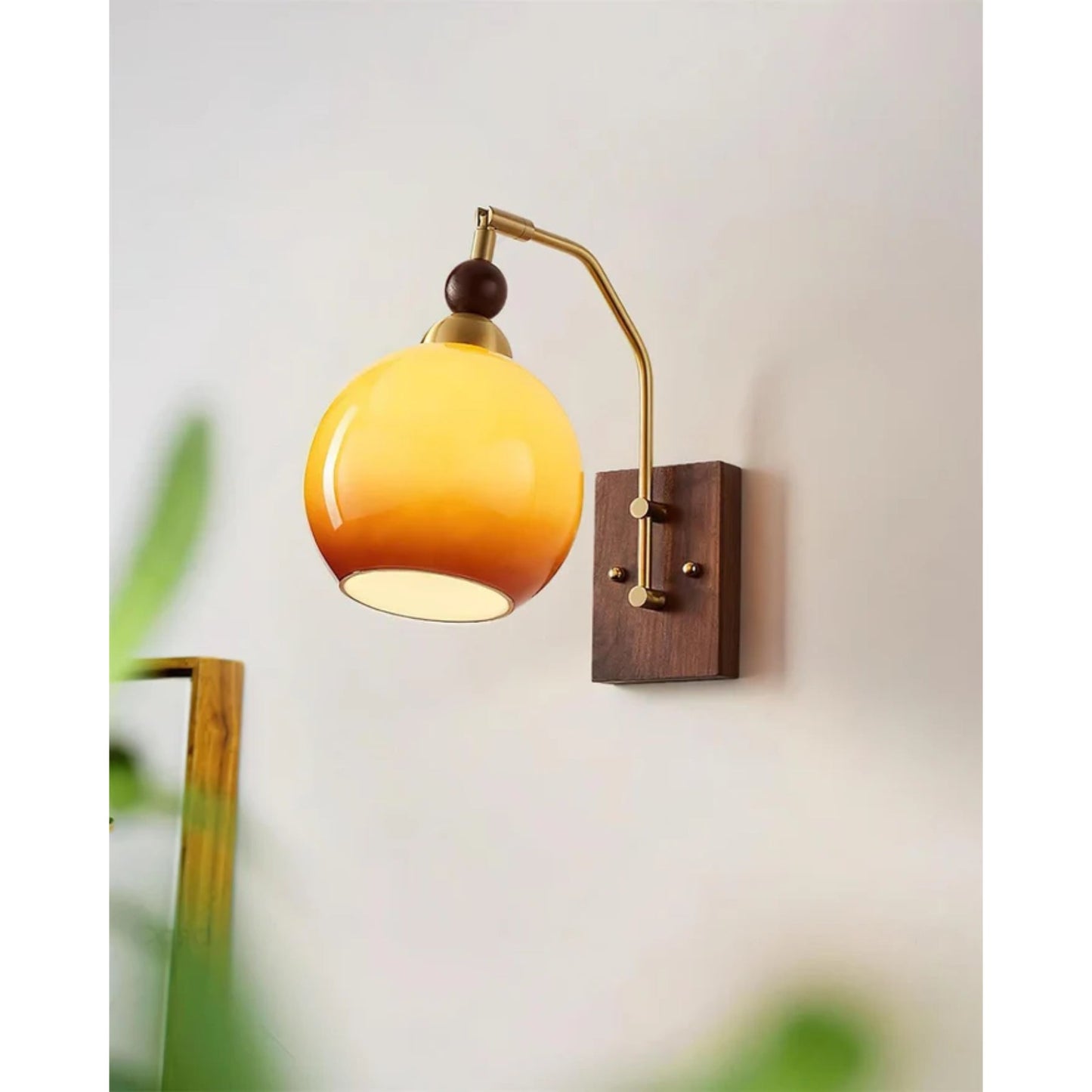 Vue latérale de l'applique avec bras ajustable