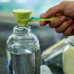Cuillère extensible verte pour mesurer les suppléments en poudre
