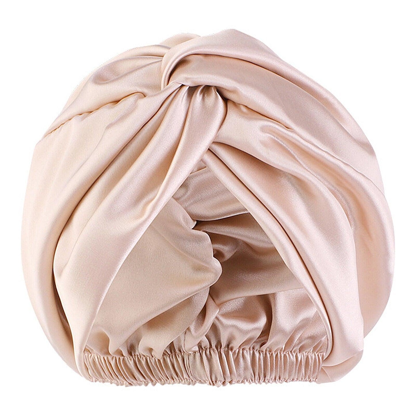 Turban en soie plié, montrant sa doublure intérieure