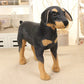 Peluche chien noir réaliste sur fond blanc