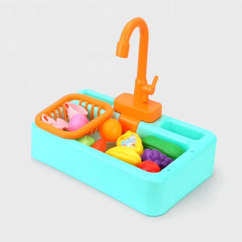 Vue latérale du jeu d'eau avec légumes et robinet