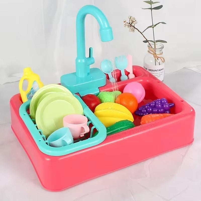 Ensemble de jeu d'eau avec robinet et légumes colorés