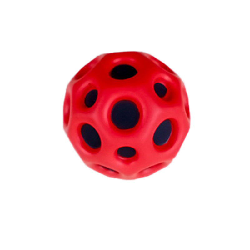 Balle de jeu douce posée sur une surface en bois