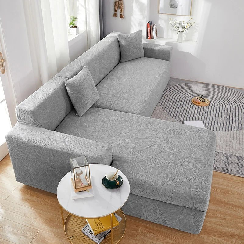 Housse en polyester ajustée sur canapé en L moderne