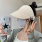Vue latérale du chapeau de soleil montrant le support de masque intégré