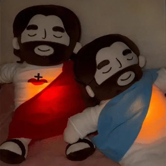 Peluche Jésus Enfant entourée de jouets, ambiance chaleureuse