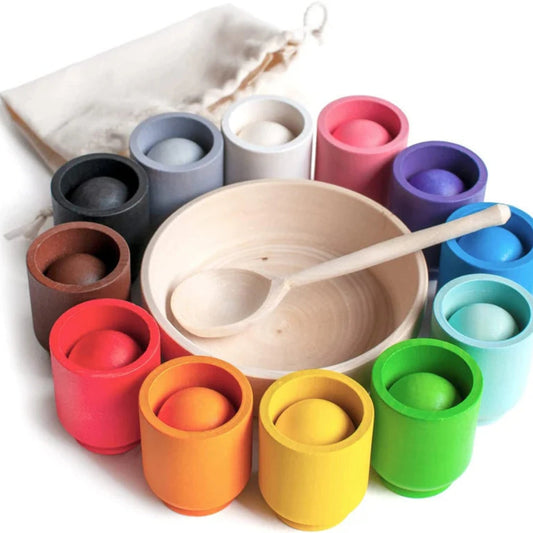 Ensemble de jeu avec cuillère et balles multicolores