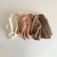 Gilet tricoté enfant en coton blanc, marron et rose