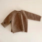 Vue de dos du gilet tricoté pour enfants
