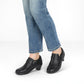Vue latérale d'un shootie noir en daim déperlant