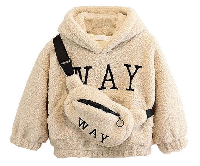 Pull d'hiver enfant en tissu teddy doux sur cintre