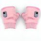 Gants chauffants en rose, pliés pour un rangement facile