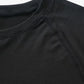 Détail du tissu respirant du t-shirt de compression