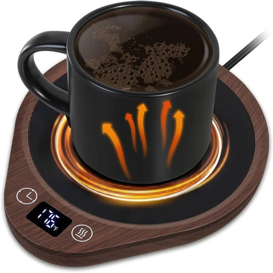 Réchauffeur de boisson sur un bureau avec une tasse et un livre