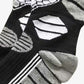 Vue latérale des chaussettes de ski avec zones de compression