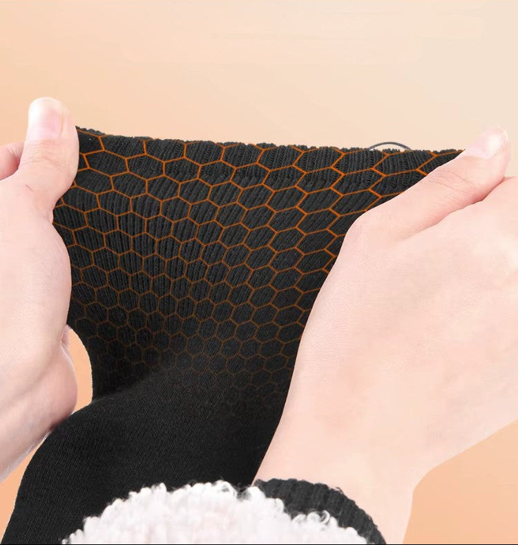Chaussettes enroulées montrant les zones de chauffage intégrées