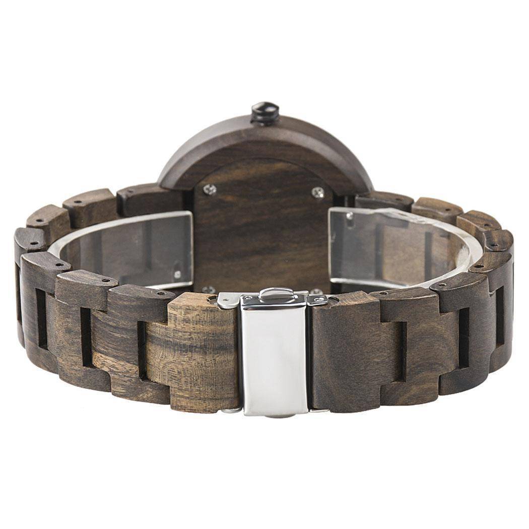 Montre en bois ébène avec cadran clair et aiguilles visibles