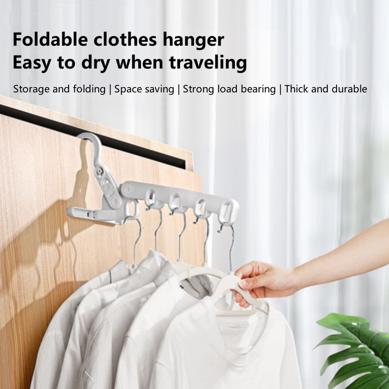 Séchoir pliable gris avec cinq ouvertures pour vêtements
