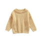 Pull bébé en laine, détail des poignets élastiques