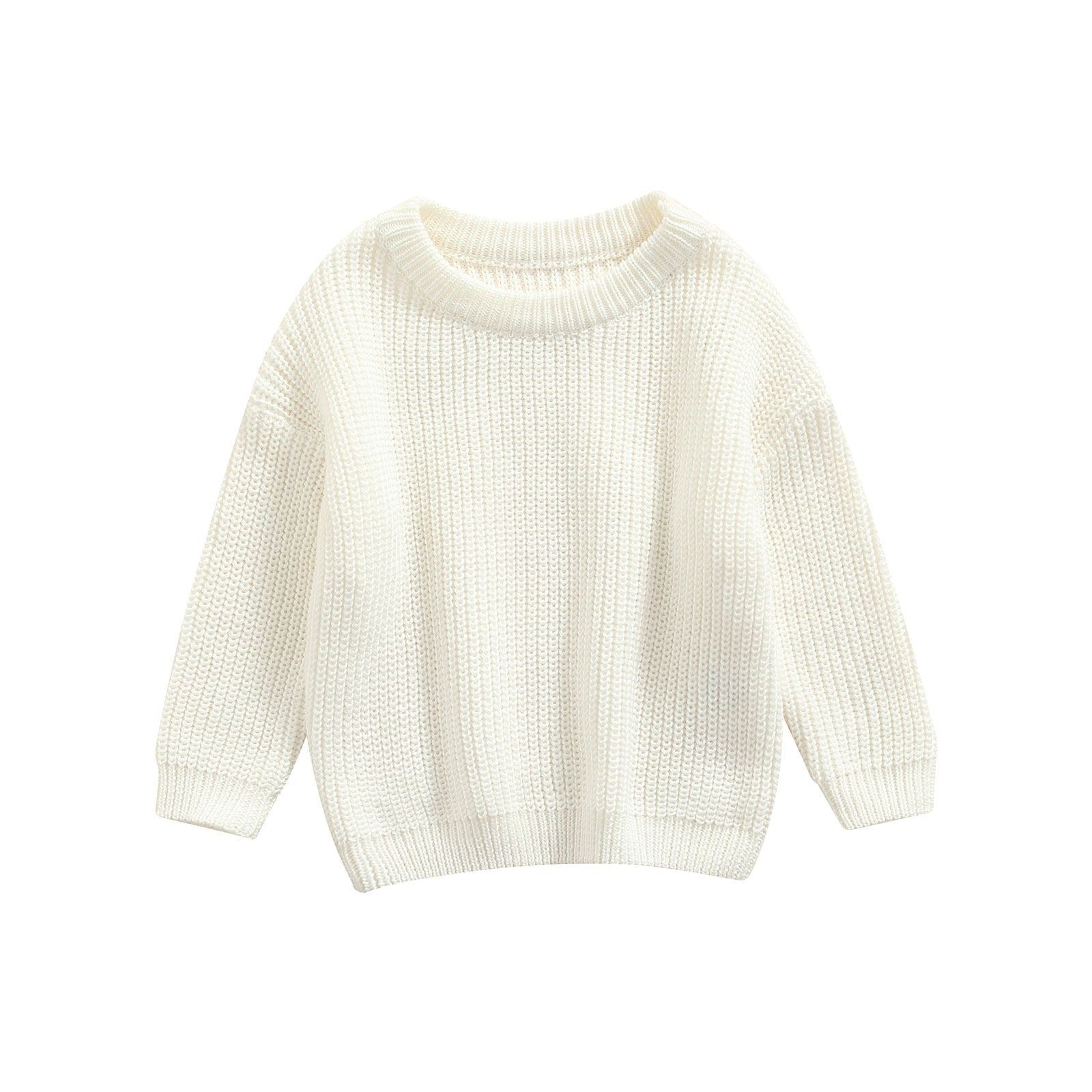 Gros plan sur la maille d'un pull enfant, couleur unie