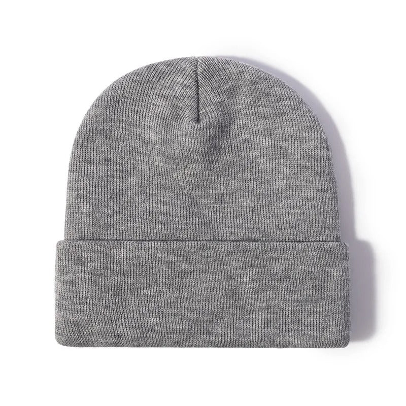 Vue de dessus d'un bonnet gris avec une personnalisation en blanc