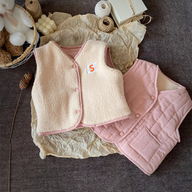Gilet enfant réversible, côté rose exposé