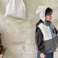 Vue de dos du gilet enfant, texture Sherpa visible