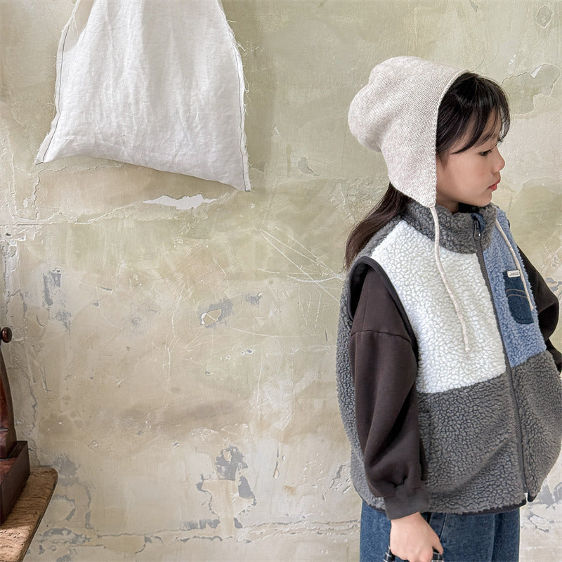 Vue de dos du gilet enfant, texture Sherpa visible