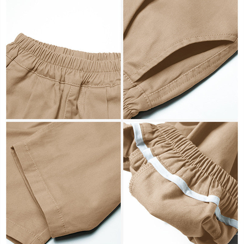 Vue de côté d'un pantalon enfant gris en coton respirant