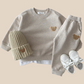 Ensemble jogging enfant gris avec motif ours