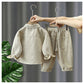 Veste enfant en coton avec boutons, vue de face