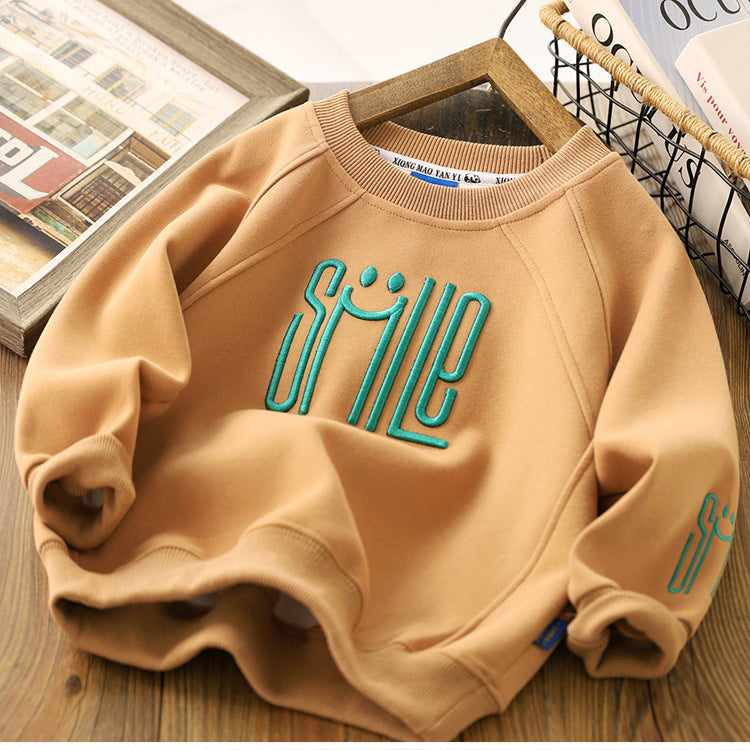 Pull enfant marron avec grand smiley, tissu confortable