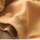 Détail des manches du pull enfant blanc avec smiley