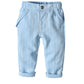 Zoom sur les boutons et finitions du costume pour enfant