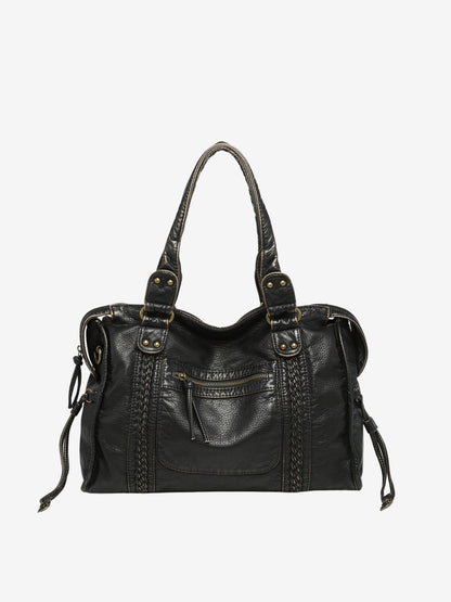 Sac noir sur fond neutre, design intemporel