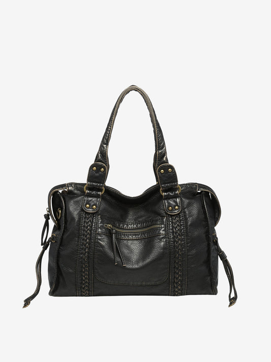 Sac noir sur fond neutre, design intemporel