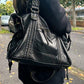 Sac porté en bandoulière, style élégant et pratique