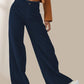 Vue arrière du pantalon large, soulignant la coupe ample