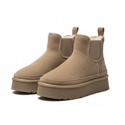 Bottines noires montrant la stabilité de la semelle