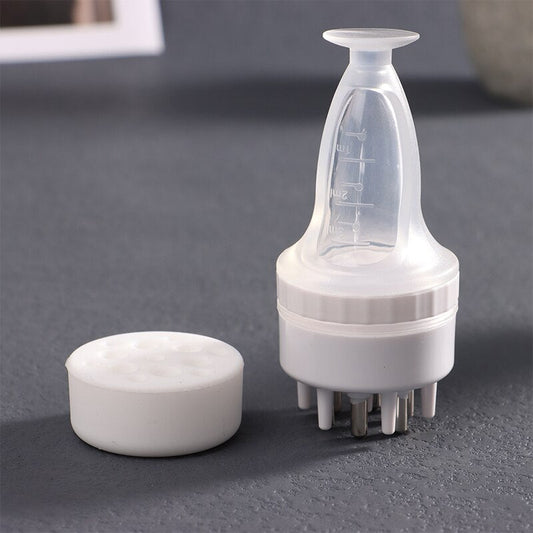 Peigne applicateur d'huile avec réservoir de 3ML visible