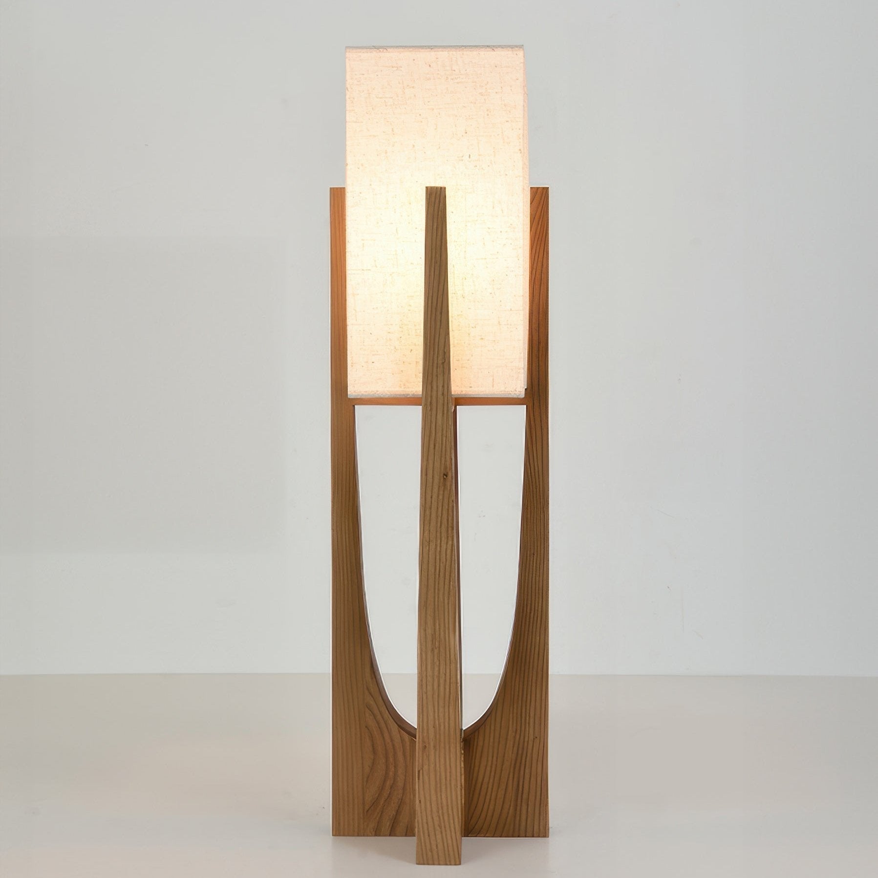 Vue latérale de la lampe de sol en bois et tissu