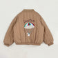 Veste enfant en polaire montrée de profil