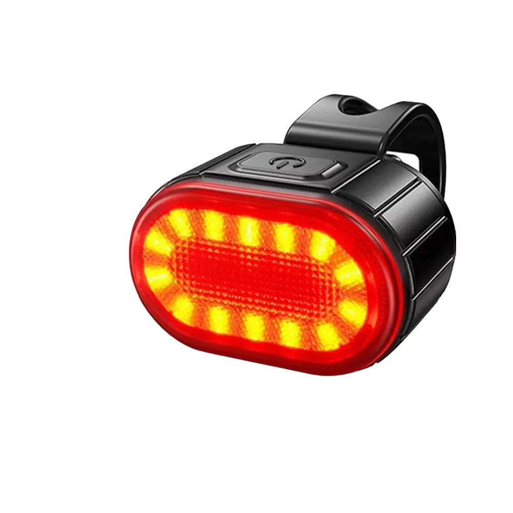 Phare et feu arrière de vélo sur un fond blanc