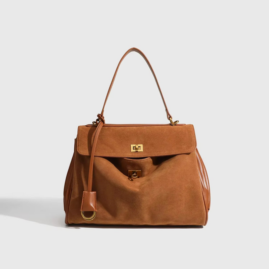 Sac à main en daim, détail de la bandoulière