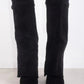 Bottes portées avec une jupe pour un style chic