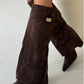 Bottes portées avec une robe pour une occasion habillée