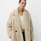 Manteau long en fausse fourrure avec double boutonnage